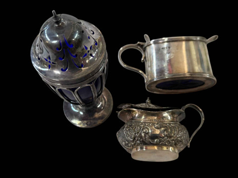 Two silver mustard pots and silver caster with blue glass liner (3). thumbnail