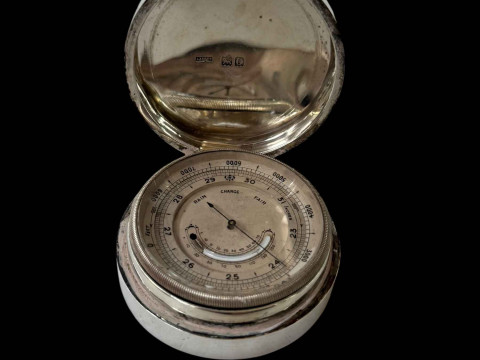 Edwardian silver cased desk barometer, London 1902, 6.25cm diameter.
