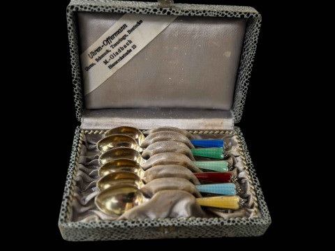 Cased set of six silver and enamel coffee spoons, Birmingham 1957.