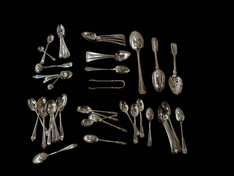 Collection of Georgian and later silver teaspoons and dessert spoons, approximately 50 pieces.