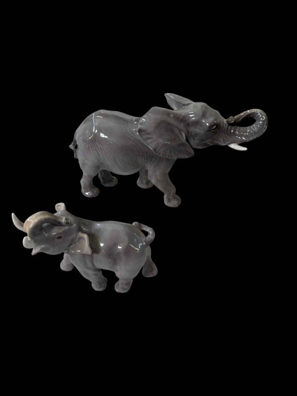 Royal Copenhagen elephant and calf, largest 23cm length (2).