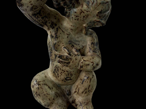 Large Knud Kyhn Royal Copenhagen sitting faun, 33cm.