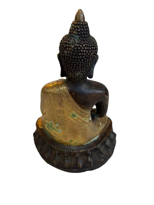 Chinese Buddha in bronze with part gilt, 31cm.