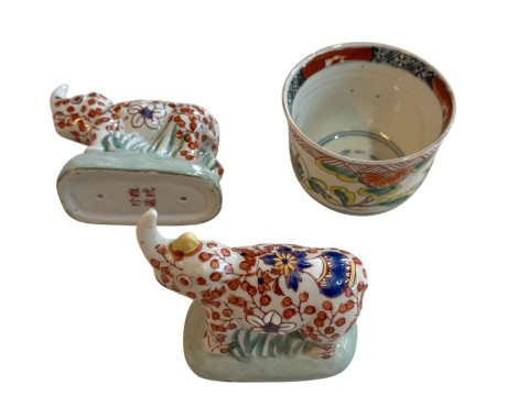 Two small Chinese rhino, signed Yayou Zhen Cang, and small bowl (3).