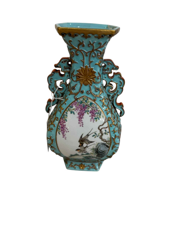 Chinese two handle vase with panels of birds on relief gilt and blue ground, seal mark, 20.5cm.