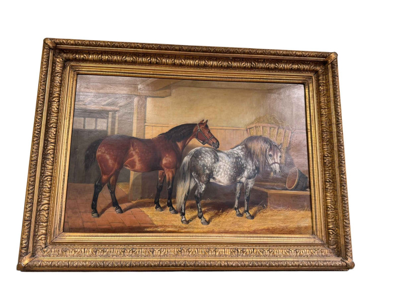 E Lloyd, Two Horses in a Stable, oil on canvas, signed and dated 29th August 1882, lower right, 44.5cm by 68cm, in gilt frame, and T Wood, Cattle in a Woodland Stream, signed oil on canvas board, 59cm by 44cm, in gilt frame (2).