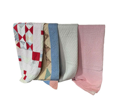 Four antique quilts including two patchwork.