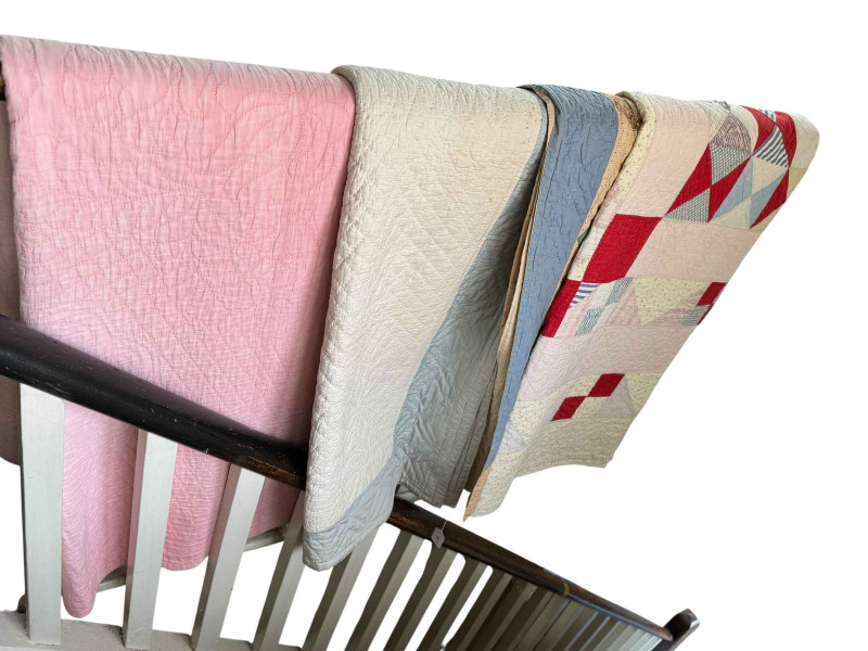 Four antique quilts including two patchwork.