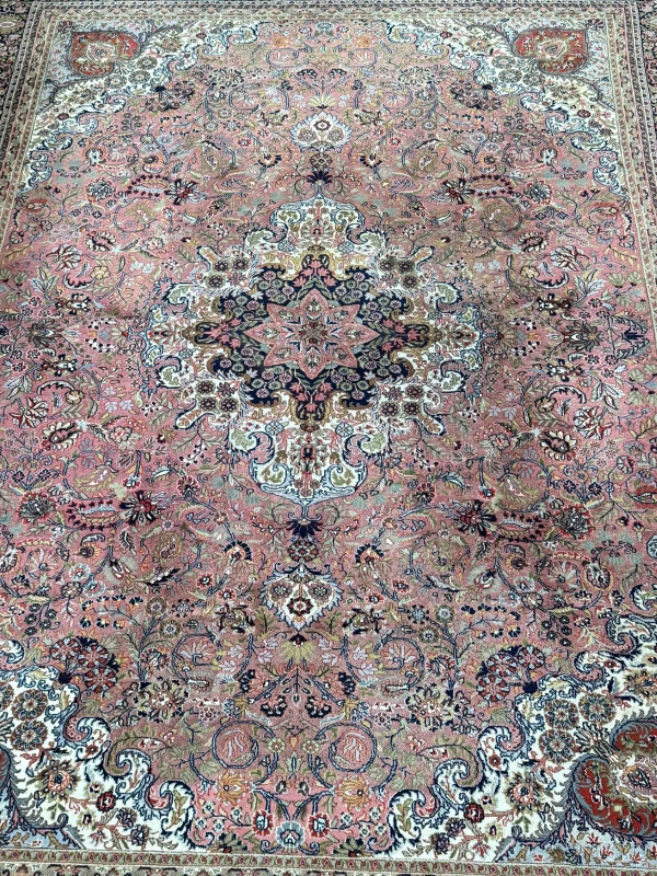 Persian rose ground carpet with central medallion, 3.40 by 2.56.