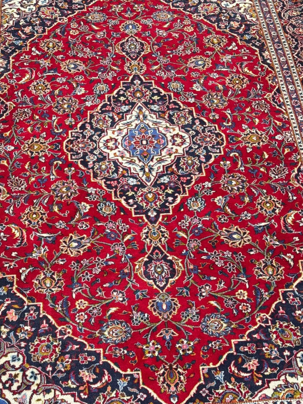 Persian floral decorated carpet with central medallion, 3.40 by 2.40.