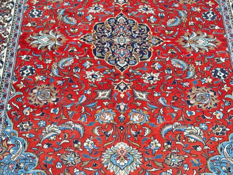Persian floral decorated carpet with central medallion, 2.82 by 1.95. thumbnail