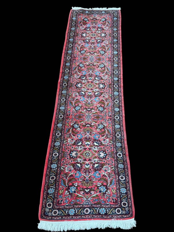 Persian floral decorated carpet runner, 3.00 by 0.75.