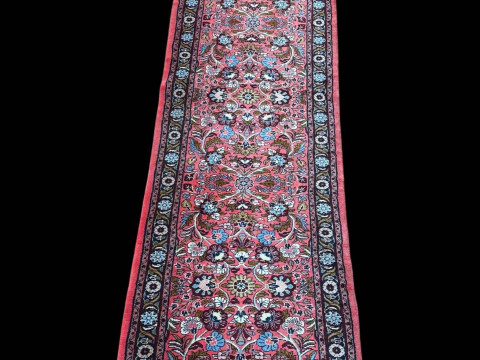 Persian floral decorated carpet runner, 3.00 by 0.75.
