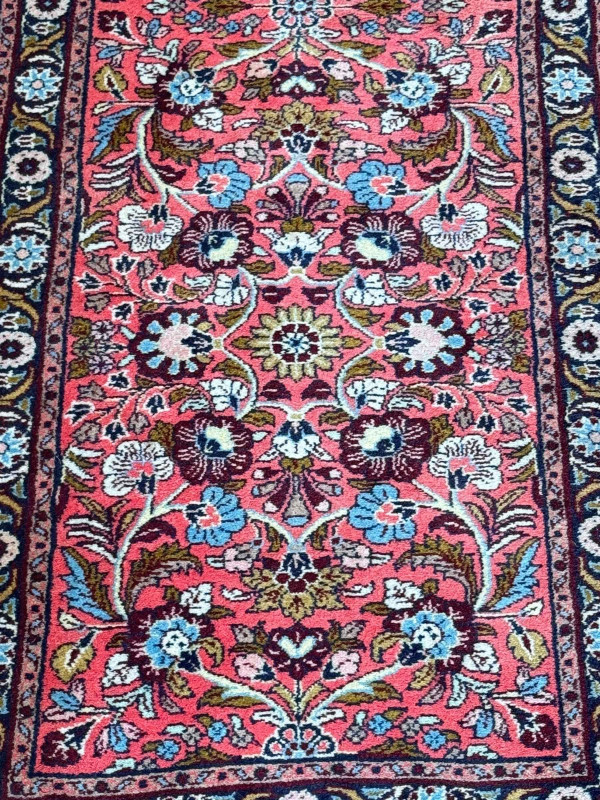 Persian floral decorated carpet runner, 3.00 by 0.75.