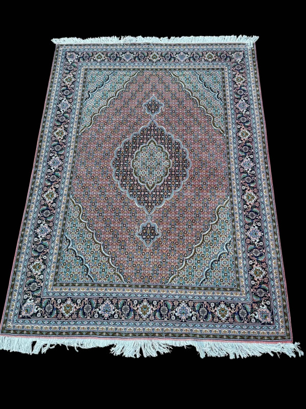 Persian rose ground carpet with central medallion, 2.13 by 1.51.