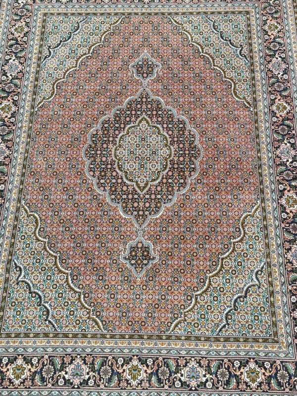 Persian rose ground carpet with central medallion, 2.13 by 1.51.