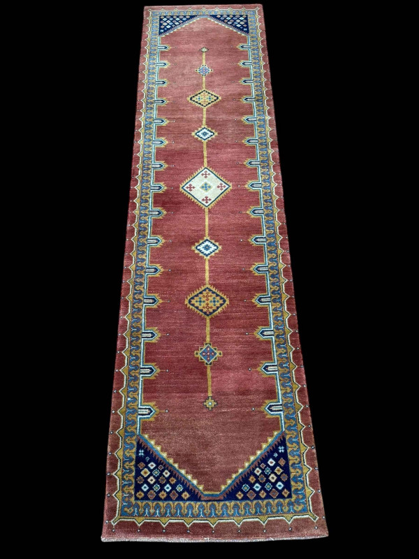 Pair rust ground Persian runners, 3.00 by 0.78.