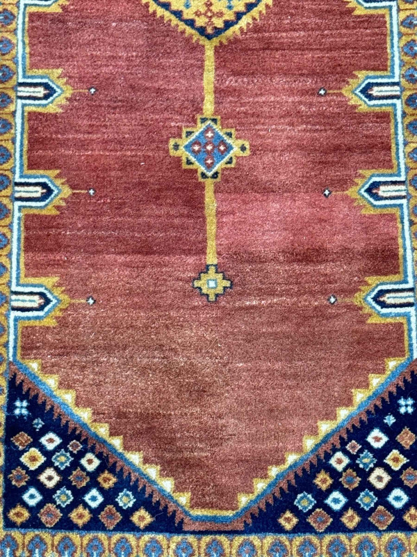 Pair rust ground Persian runners, 3.00 by 0.78.