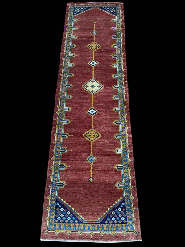 Pair rust ground Persian runners, 3.00 by 0.78.