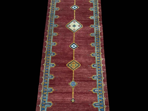 Pair rust ground Persian runners, 3.00 by 0.78.