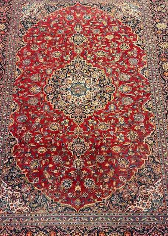 Persian floral decorated carpet with central medallion, 3.70 by 2.60.