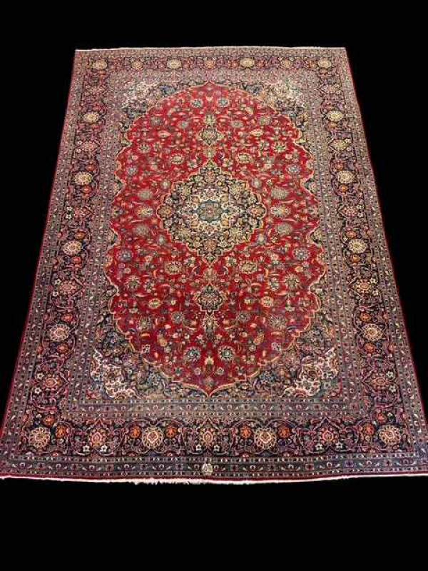 Persian floral decorated carpet with central medallion, 3.70 by 2.60.