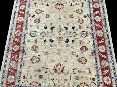 Indian border carpet, 2.33 by 1.67.