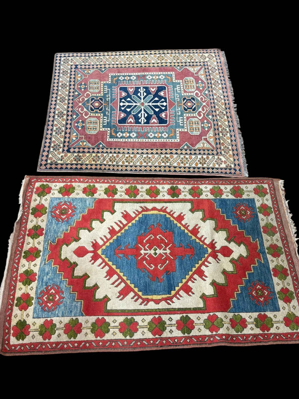 Two Eastern design wool rugs, 1.65 by 1.45 and 1.96 by 1.22.