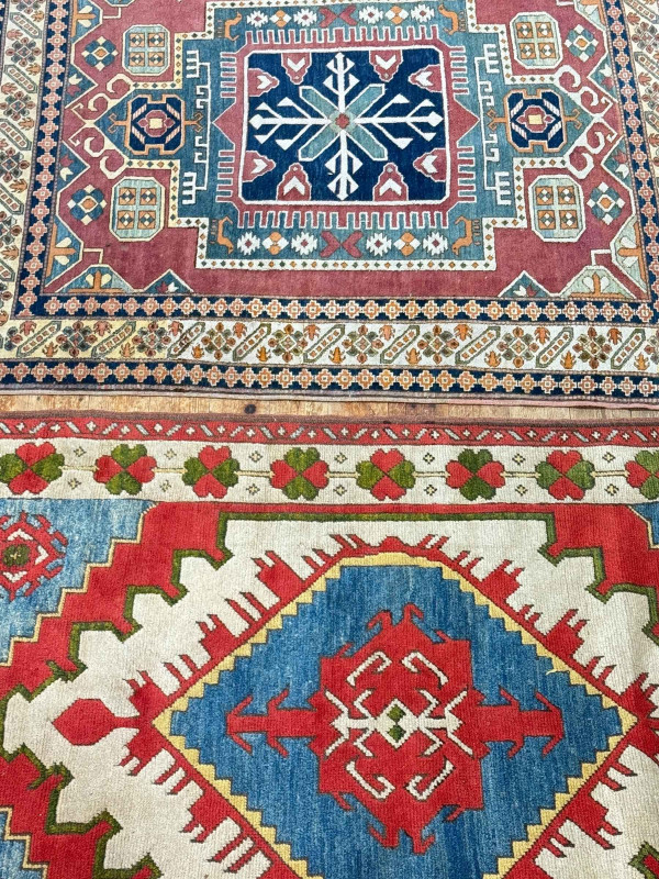 Two Eastern design wool rugs, 1.65 by 1.45 and 1.96 by 1.22.