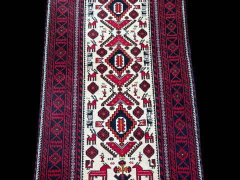 Persian design rug with antlered animal decoration, 2.00 by 0.96.
