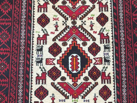 Persian design rug with antlered animal decoration, 2.00 by 0.96. thumbnail