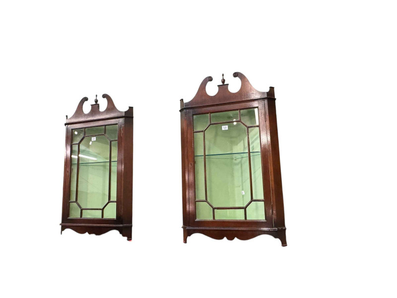 Bevan & Funnell? mahogany double standing corner cabinet and pair glazed panel door corner wall cabinets (3).