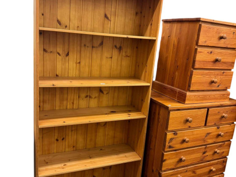 Five piece pine bedroom suite comprising two door wardrobe with two base drawers, dressing table, dressing stool, six drawer chest, three drawer pedestal, double and single bedsteads and five tier open bookcase (8). thumbnail