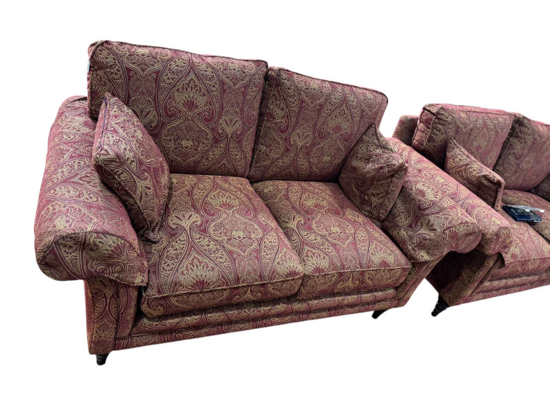 Pair Parker Knoll Burghley two seater settees with armcaps in Henrietta Ruby fabric, purchased from Barkers of Northallerton in excess of £3000 in 2023.