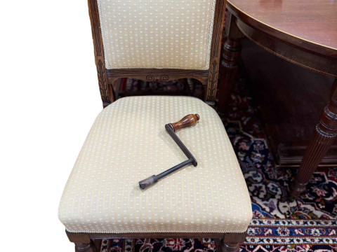 19th Century mahogany and line inlaid oval extending dining table on turned reeded tapering legs with two leaves and winder, 76cm by 122cm by 182cm (excluding leaves), together with a set of six Victorian carved oak dining chairs. thumbnail