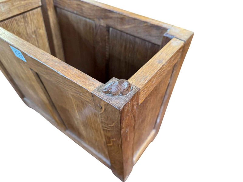 Peter 'Rabbitman' Heap panelled oak magazine rack, 35cm by 42cm by 23cm.
