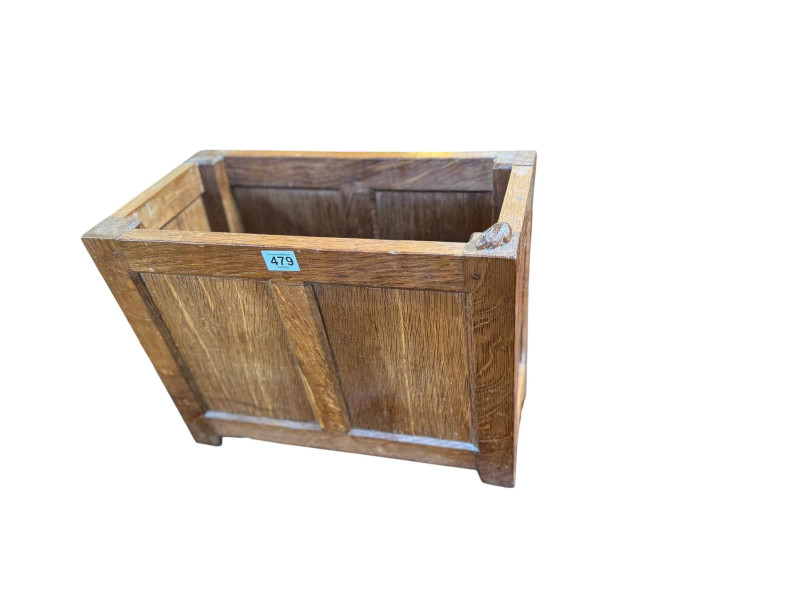 Peter 'Rabbitman' Heap panelled oak magazine rack, 35cm by 42cm by 23cm.