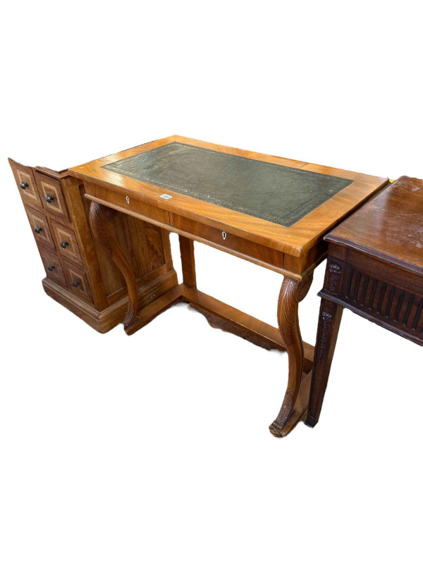 Regency style mahogany two drawer writing table on scrolled front supports to paw feet, 77cm by 87.5cm by 50cm.