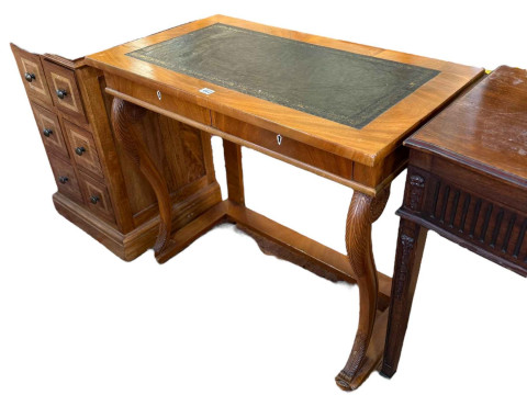Regency style mahogany two drawer writing table on scrolled front supports...