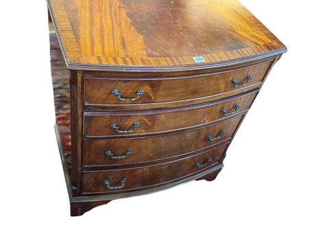Mahogany crossbanded bow front chest of four long drawers, 77.5cm by 69cm...