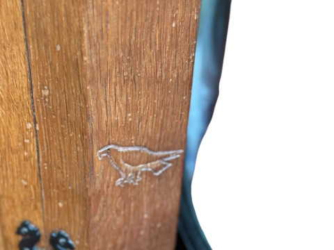 Albert 'Eagleman' Jeffrey adzed oak double standing corner cabinet having a pair of leaded glazed panel doors above a pair of panelled cupboard doors, 198cm. thumbnail