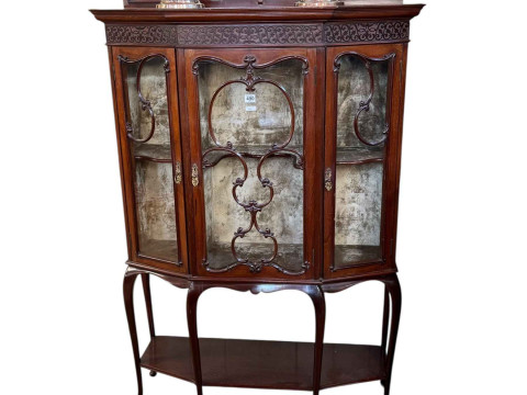 Late Victorian/Edwardian mahogany shaped front three door vitrine having...
