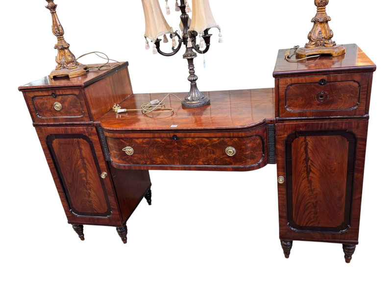Regency mahogany and ebony inlaid pedestal breakfront sideboard on turned legs, 113cm by 184cm by 64cm.