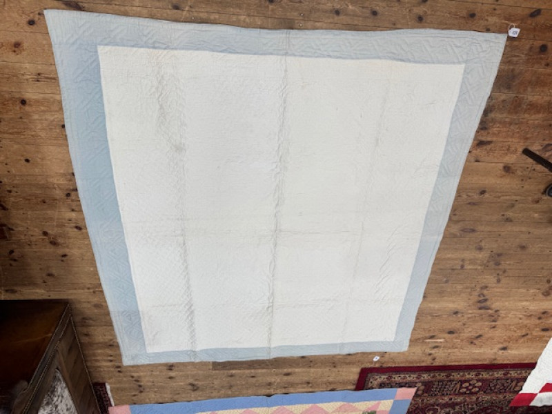 Four antique quilts including two patchwork.