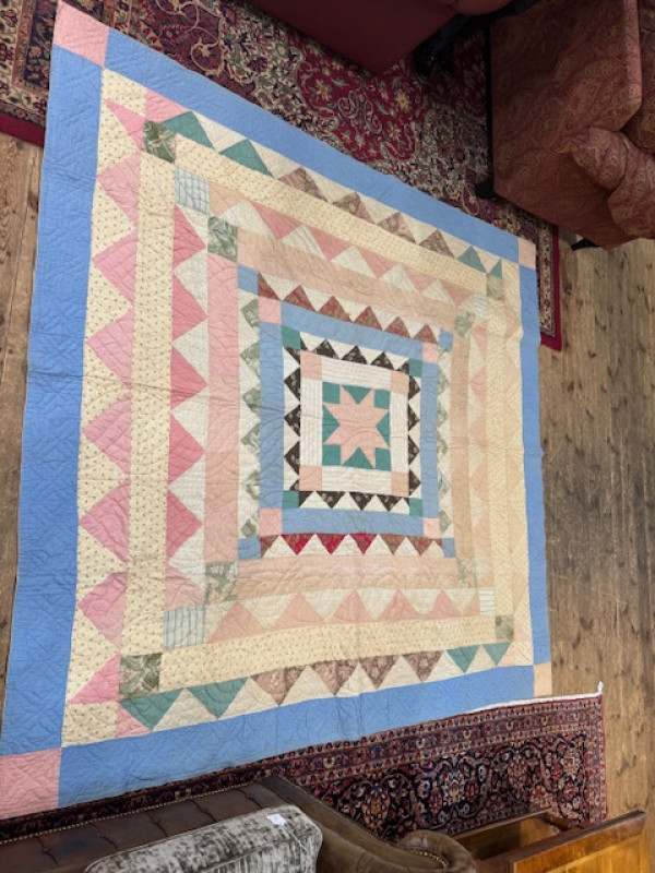 Four antique quilts including two patchwork.