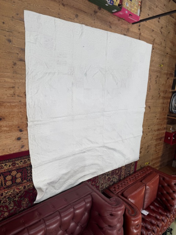 Four antique quilts including two patchwork.