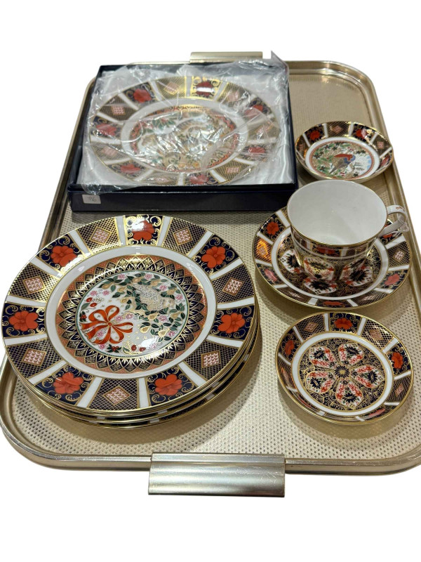 Four Royal Crown Derby Christmas plates, clover and lavender plate, cup, saucer and two dishes.