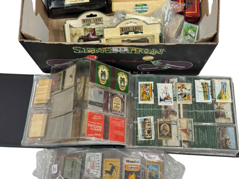 Matchbox covers and label and diecast vehicles.