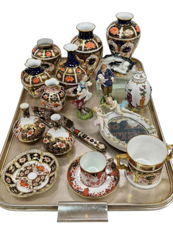 Tray of Royal Crown Derby including vases, loving cup, coffee can and saucer, Continental pottery figures and mirror, and Royal Worcester goat.