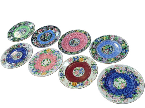 Collection of eight Maling wall plaques.